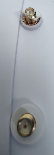 File:Cudy AP1300 RPSMA Slotted Nuts Covered by Doughnut Stickers.jpg